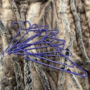 Six purple hangers. FREE if bundled with any other item.
